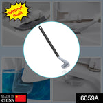 Space-saving long-handled golf toilet brush hanging on its built-in eyelet for quick drying.