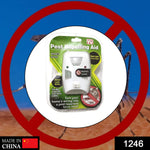A single white pest repelling aid in its clear plastic and green cardboard packaging, against a blurry background.