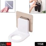 A white wall-mounted bottle holder with a metallic adhesive pad, with insets showing the pad and two holders in use.