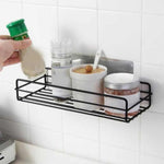 Close-up of the durable metal wall mount bathroom shelf.