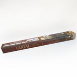A long, rectangular brown box of GUGAL premium incense sticks on a white background.