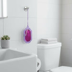 Compact lavender scent toilet freshener hanging in bathroom