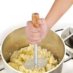 Close-up of the robust stainless steel mashing head on the pav bhaji masher.