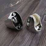 Flexible shower holder with fixing screws, ready for easy installation.