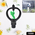 Butterfly-shaped garden sprinkler nozzle distributing a gentle, even spray across plants.