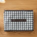 Foldable fabric storage basket in flat position