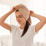 Twist the microfiber towel wrap and secure with elastic loop for easy drying
