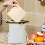 A Reusable Silicone Food Storage Bag heating food inside a microwave, showing its microwave-safe feature.