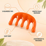 An orange scalp massager with text highlighting its five rounded tips, gentle massage, easy grip, and lightweight reusable