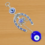 Handcrafted evil eye wall hanging featuring beads and tinkling chime