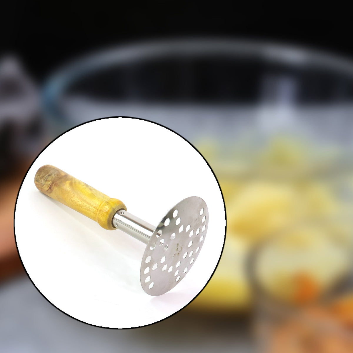 A circular inset shows the stainless steel masher with a wooden handle, superimposed over a blurred background of mashed