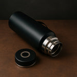 Stainless steel water bottle keeping drinks cold on a hot day.