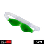 A green gel eye mask with a clear strap and white velcro closure is shown against a white background.