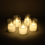 Flameless votive candles providing soft ambient decor lighting