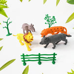Transparent packaging displaying the wild animal toy set designed for educational play