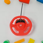 A child's hand guiding the rechargeable RC car across a smooth surface, in action.