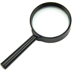 A black magnifying glass with a clear lens and a sturdy handle is shown against a plain white background.