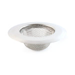 Stainless steel kitchen sink strainer filtering food particles and hair