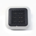 Small room warmed by the compact 600W plug-in wall-mounted room heater