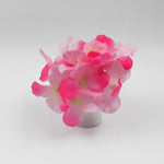 Elegant LED mood light in a glass vase with silk flowers, offering a gentle glow.