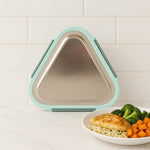 Close-up of Ganesh Trinity triangle lunch box leak-resistant locking clip