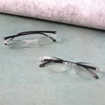 Protective case storing lightweight rimless reading glasses for travel