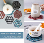 A set of PVC placemats providing high-temperature insulation for kitchen dining.