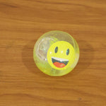 Kids using smiley face sensory water ball toy in play