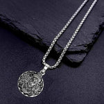 Detailed view of the Hanuman Locket with its accompanying chain.