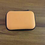 Rectangular hard shell storage case with zipper closure
