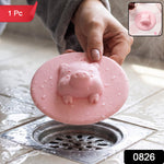 Single piece of cute pig design silicone floor drain cover, round shape.