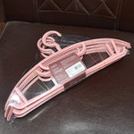 Compact plastic cloth hangers keeping clothes wrinkle-free and well arranged