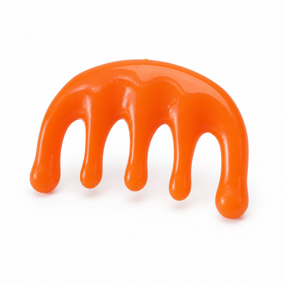 A single orange plastic scalp massager with five rounded prongs, against a plain white background.