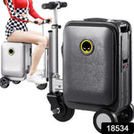 Person riding the Electric Scooter Suitcase through an airport terminal, showcasing effortless mobility.
