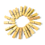 Bamboo cloth clips creatively used to hang decorative string lights for ambiance.