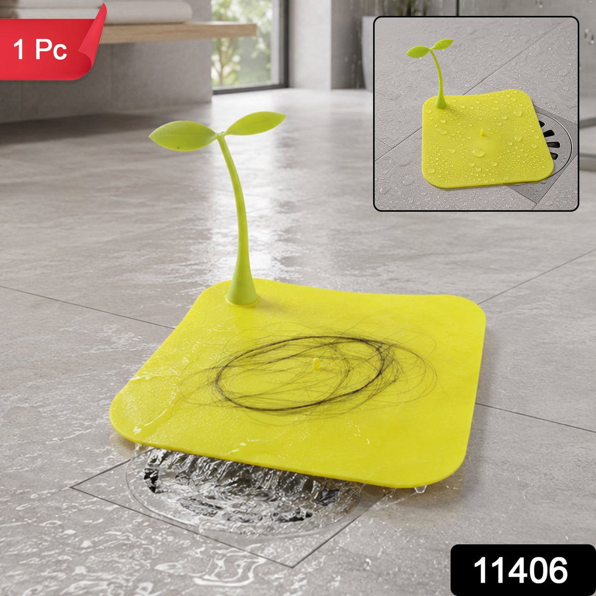 A bright yellow square silicone drain cover with a green sprout-like handle, collecting hair on a wet floor.