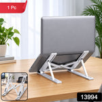 White laptop stand with gray non-slip pads, featuring multiple adjustment points and a central pivot.