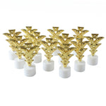 A group of twelve golden Christmas tree LED tealight candles are arranged neatly on a plain white surface.