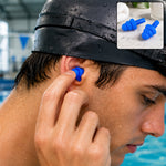 A man in a black swim cap inserts a blue silicone earplug into his ear, with a small inset showing the earplugs.