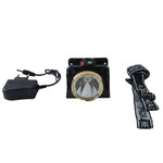 A black and gold headlamp, a charger, and a black and white head strap arranged on a white background.