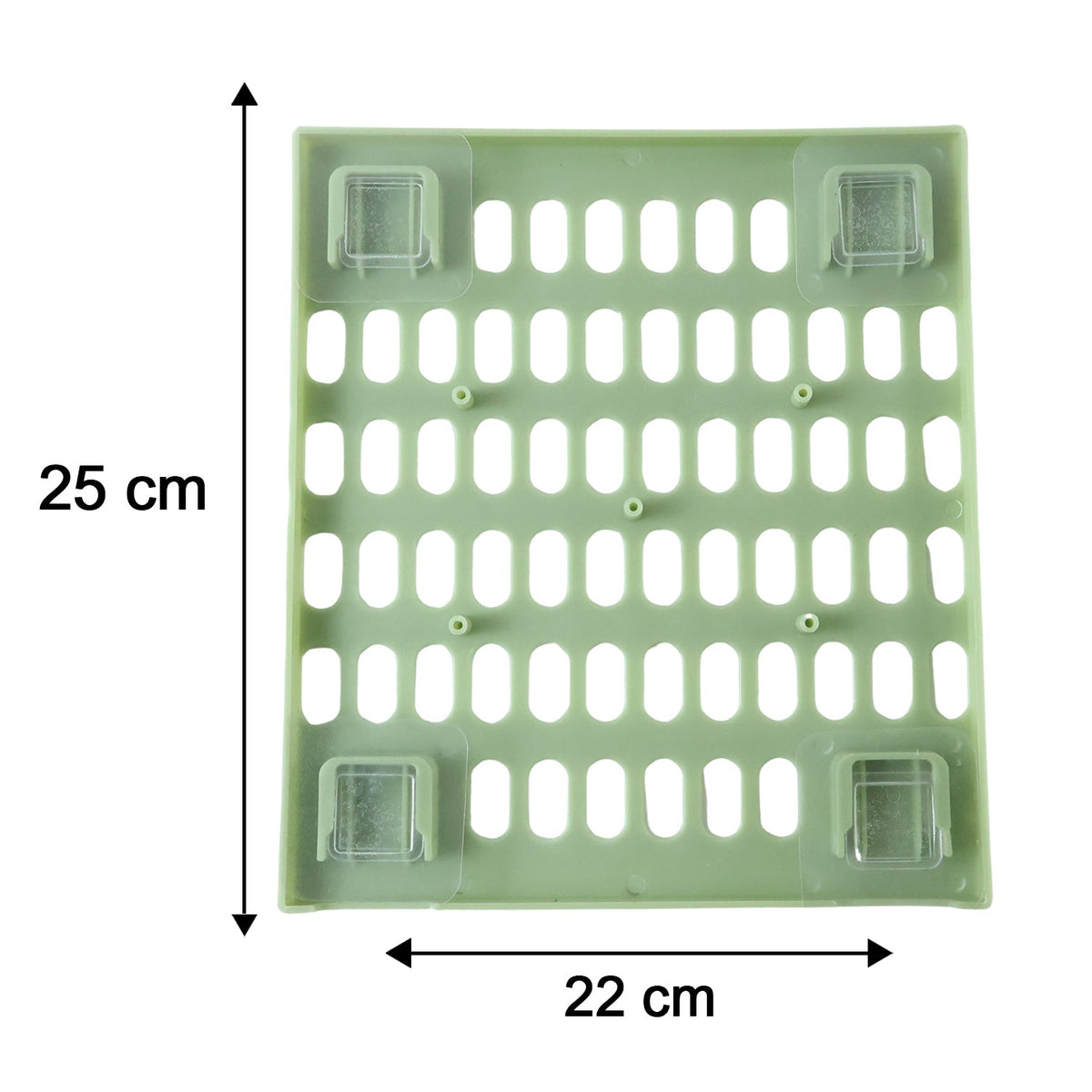 A light green pegboard with dimensions of 25 cm by 22 cm, showing four clear adhesive pads on the back.