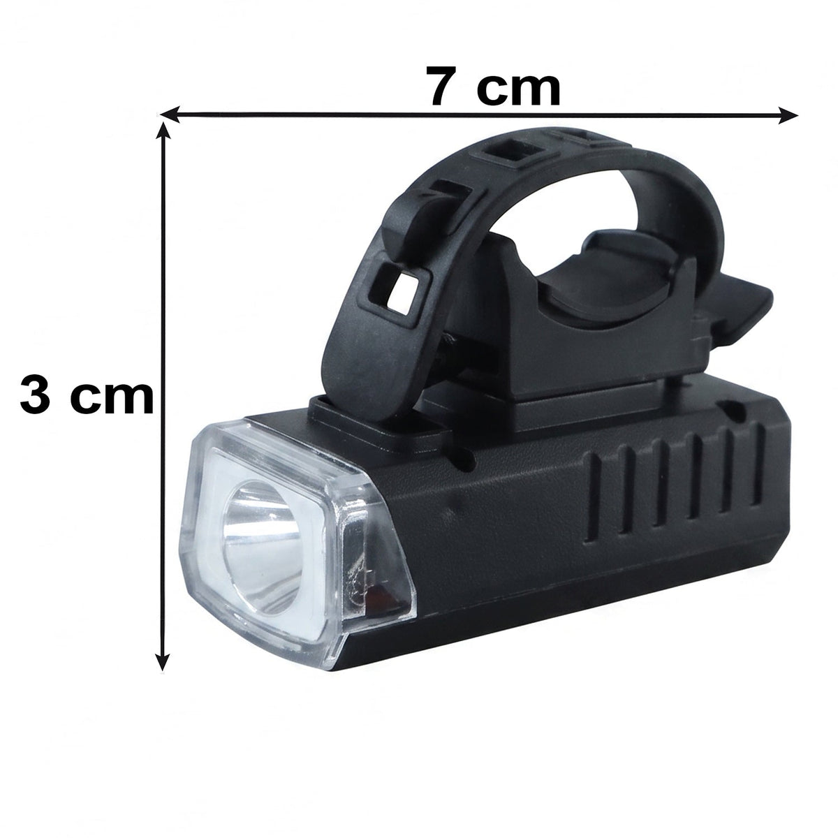 Black rectangular bicycle headlight with a clear lens shown with dimensions of 7 cm length and 3 cm height on a white