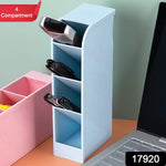 Top-down view of the 4-compartment stationery organiser filled with various office supplies.