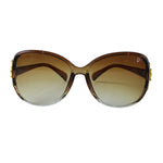 Oversized sunglasses with brown gradient frame on white background.