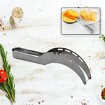 A silver stainless steel watermelon slicer lies on a white wooden surface with herbs and spices around it