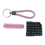 A pink braided wrist loop keychain, a pink number tag, and a sheet of number stickers on a white background.