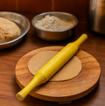 Side view of the ergonomic wooden Bombay belan, a comfortable kitchen tool.