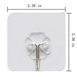 A transparent self-adhesive hook with a silver metal hook on a white background, showing its 2.36 inch dimensions.