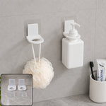 Wall mounted shampoo bottle holders in bathroom