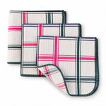 Three checked dish cloths on white background